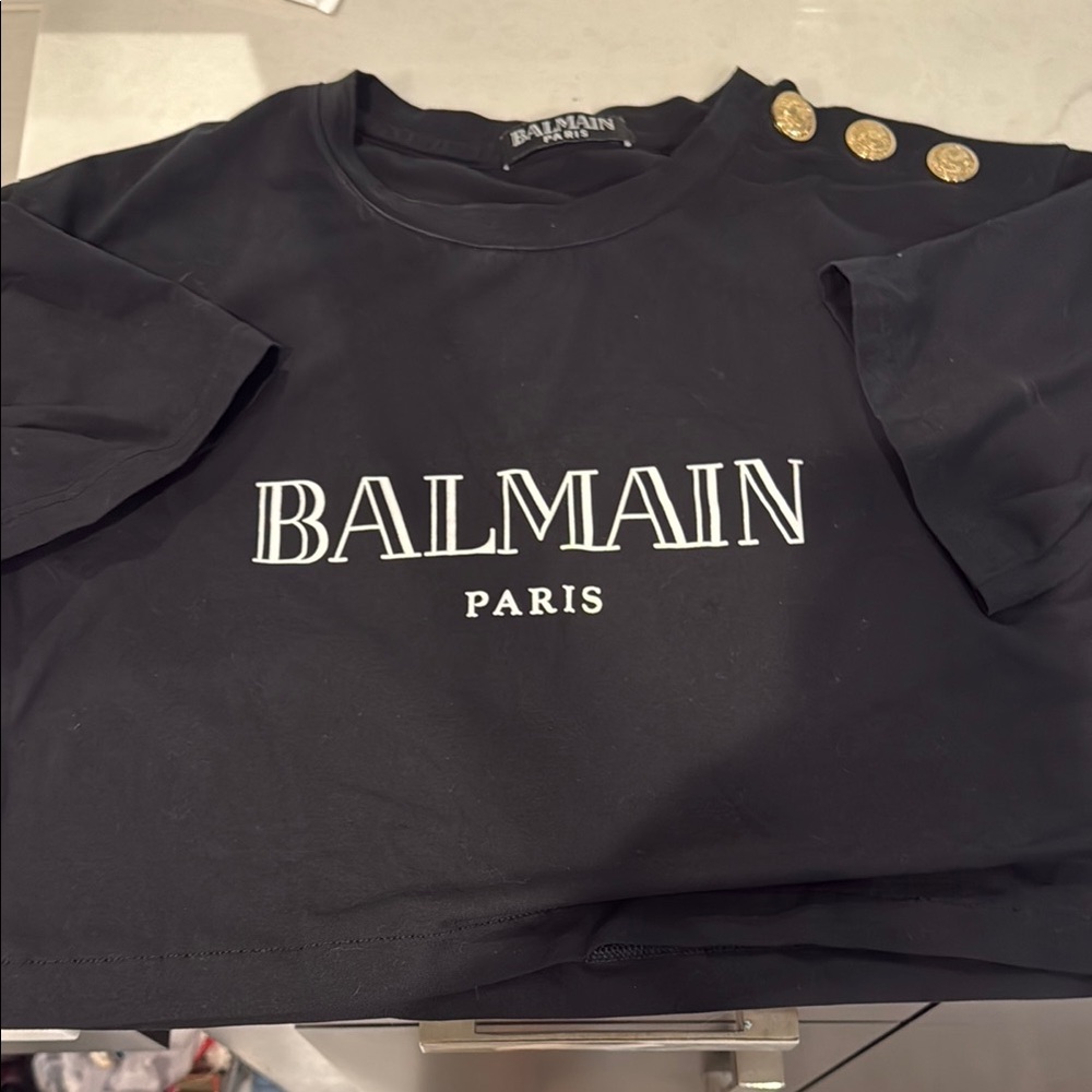 Balmain Tee in Black with Gold Accents small
Used good condition